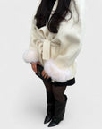 Woolcat – Elegant coat with faux fur details