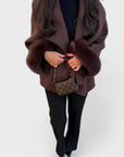 Woolcat – Elegant coat with faux fur details