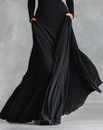 Fiorella™ - Modern long dress in black crepe with pleated boat neckline